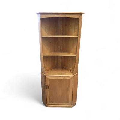 Lot 5349 - Ercol Windsor elm corner cupboard, measuring approximately 180cm tall