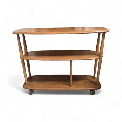 Lot 5345 - Ercol baby giraffe bookcase measuring approximately 71cm tall x 91cm wide