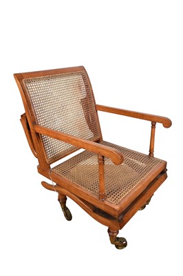 Lot 1244 - Antique teak and caned plantation chair
