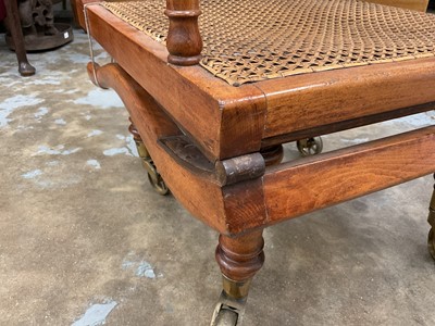 Lot 1244 - Antique teak and caned plantation chair