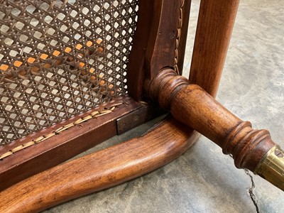 Lot 1244 - Antique teak and caned plantation chair