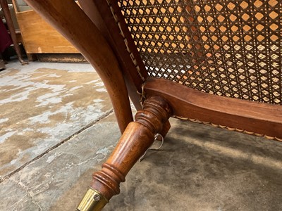 Lot 1244 - Antique teak and caned plantation chair