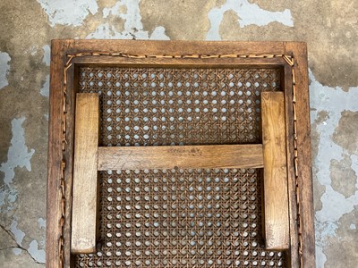 Lot 1244 - Antique teak and caned plantation chair