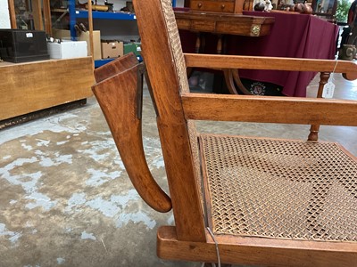 Lot 1244 - Antique teak and caned plantation chair