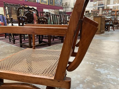 Lot 1244 - Antique teak and caned plantation chair