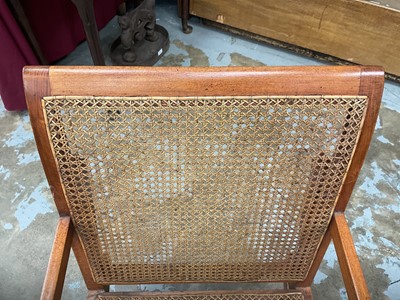 Lot 1244 - Antique teak and caned plantation chair