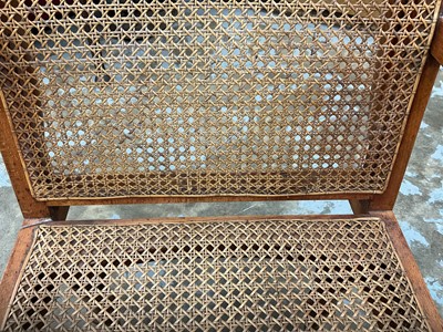 Lot 1244 - Antique teak and caned plantation chair