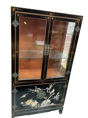 Lot 1300 - Oriental lacquered display cabinet with two doors below decorated with birds and flowers, 90cm wide, 40cm deep, 170.5cm high