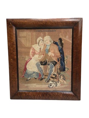 Lot 1233 - 19th century needlework picture depicting a lady and gentleman with their cat and dog, 'John Andersen' in glazed maple veneered frame