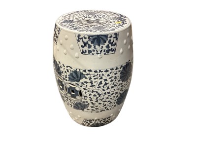 Lot 1311 - Modern oriental blue and white garden seat. 29cm diameter, 48cm high