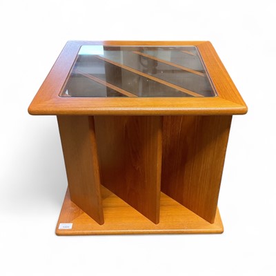 Lot 1425 - 1980s Glass topped coffee table on wheels