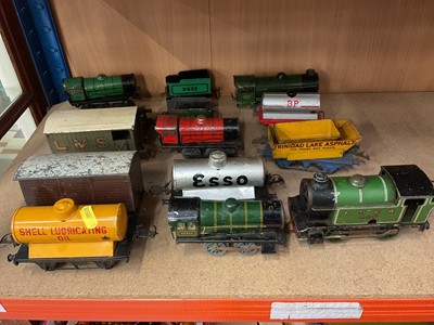Lot 75 - Hornby tinplate clockwork railway to include 5 locomotives and approximately 9 carriages/tenders