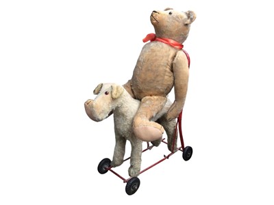 Lot 263 - Vintage children's push-along dog together with a bear