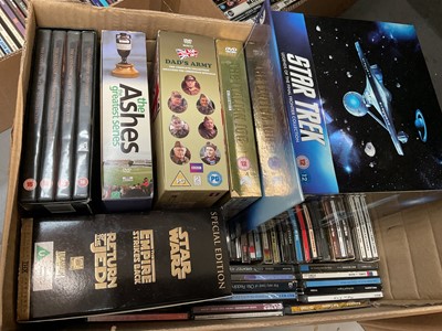 Lot 311 - Four boxes of CDs and DVDs
