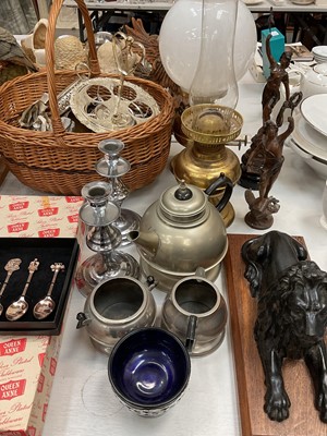 Lot 327 - Two brass oil lamps, cast metal lion on wooden base, plated ware and other items