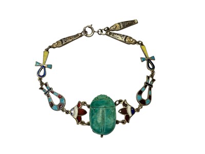 Lot 45 - 1920s Egyptian revival silver (800) enamel bracelet with a central turquoise scarab beetle