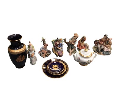 Lot 710 - Lladro figure selling oranges, together with other resin/porcelain figures, Wedgewood, teacups and saucers etc