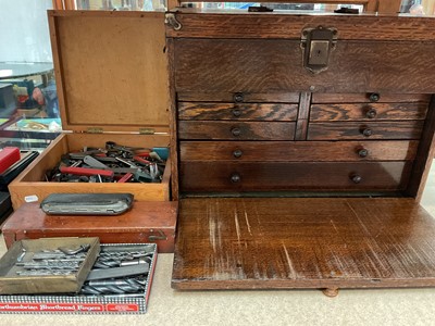 Lot 334 - Group of vintage tools including Moore & Wright micrometres in cases, other fittings and accessories, together with a vintage wooden tool cabinet with hinged lid and various draws