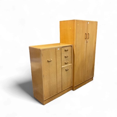 Lot 1382 - G-Plan bedroom suite designed by E. Gomme, comprising double wardrobe, 91.5cm wide, 53cm deep, 175cm high, tallboy, 88cm wide, 44cm deep, 121.5cm high and a dressing chest (3)