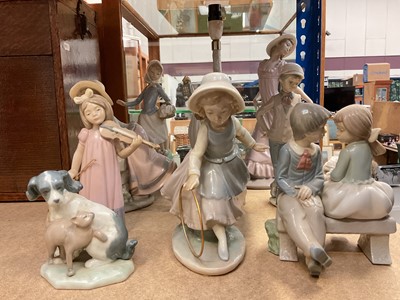 Lot 335 - Ten Nao figures and animals including a table lamp