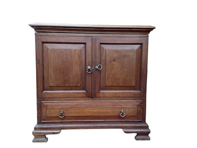 Lot 1383 - Small mahogany cabinet with hinged lid, two doors and single drawer below on bracket feet, 44.5cm wide, 35.5cm deep, 43cm high