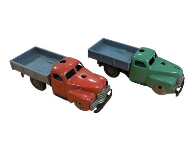Lot 1794 - Two vintage (c1950's) Schuco Varianto Lasto 3042 trucks plus one for spares and Varianto Limo 3401 (front wheels missing) (no keys), together with track accessories (1 box)