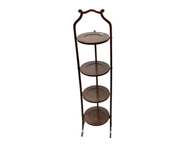 Lot 1392 - Mahogany four tier folding cake stand, 109cm high, together with a wine table (2)