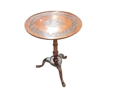 Lot 1401 - Nineteenth century mahogany tilt top wine table with leaf carved decoration, 53cm diameter, 70cm high