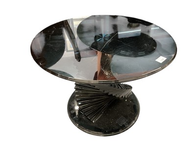 Lot 1408 - Modernist glass table with circular top on spiral staircase support and circular base, 59.5cm diameter, 45cm high