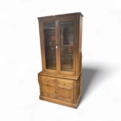 Lot 1416 - Ercol two height bookcase, 96cm wide, 47cm deep, 197cm high