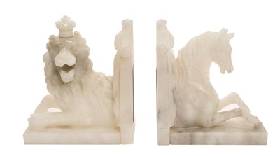 Lot 68 - H.M. Queen Elizabeth II 1977 Silver Jubilee - pair of limited edition commemorative carved alabaster lion and unicorn bookends, designed by John Spencer-Churchill, each mounted with an engrav...