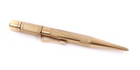 Lot 3564 - 1920s gold (9ct) propelling pencil with engine-...