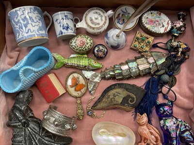 Lot 275 - Bijouterie cabinet containing 19th century Chinese silk golden lotus shoe, mother of pearl fish, etc