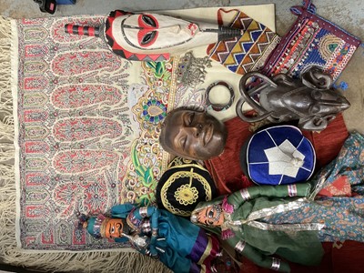 Lot 274 - Group of eastern dolls, hats, bags and textiles