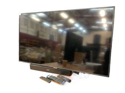 Lot 9 - 50" wall mounted Samsung smart TV model number ue50nu7400uxxu together with Bose sound bar and remotes