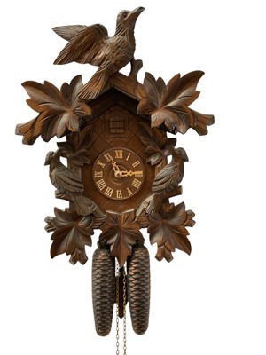 Lot 273 - German cuckoo clock in carved wooden case