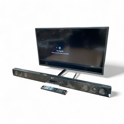 Lot 3 - 32" LG TV with remote control together with LG sound bar