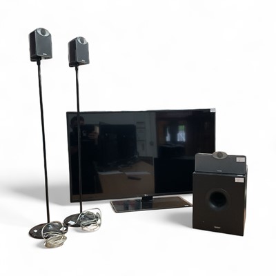 Lot 4 - 43" LG TV with remote control together with Tannoy floor standing speakers and subwoofer ( no cables)