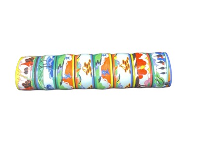 Lot 2242 - Complete set of eight Clarice Cliff napkin rings in original box