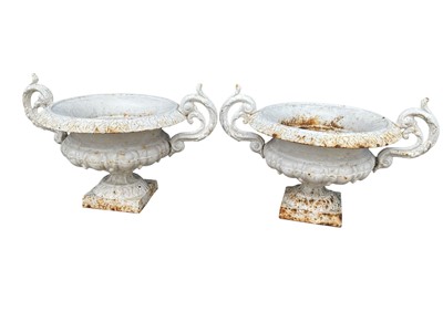 Lot 1434 - Pair of Classical cast iron garden urns, 41cm wide x 20cm high