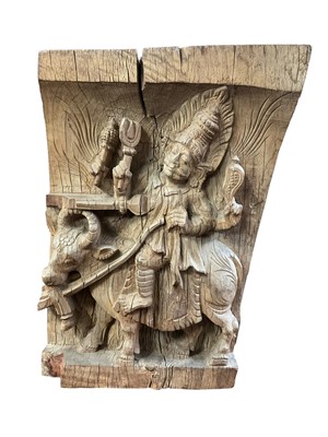 Lot 210 - Indian carved wooden relief, depicting a deity riding a bull, 32cm
