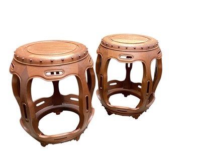 Lot 1444 - Pair Chinese hardwood drum-shaped garden seats / tables