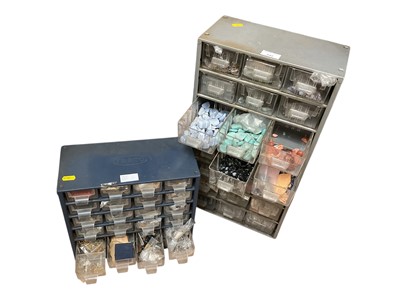 Lot 242 - Two metal draw cabinets containing loose semi-precious gem stones, various parts and pieces for jewellery making, fittings, tools etc and a box of silver/white metal sheets and wires