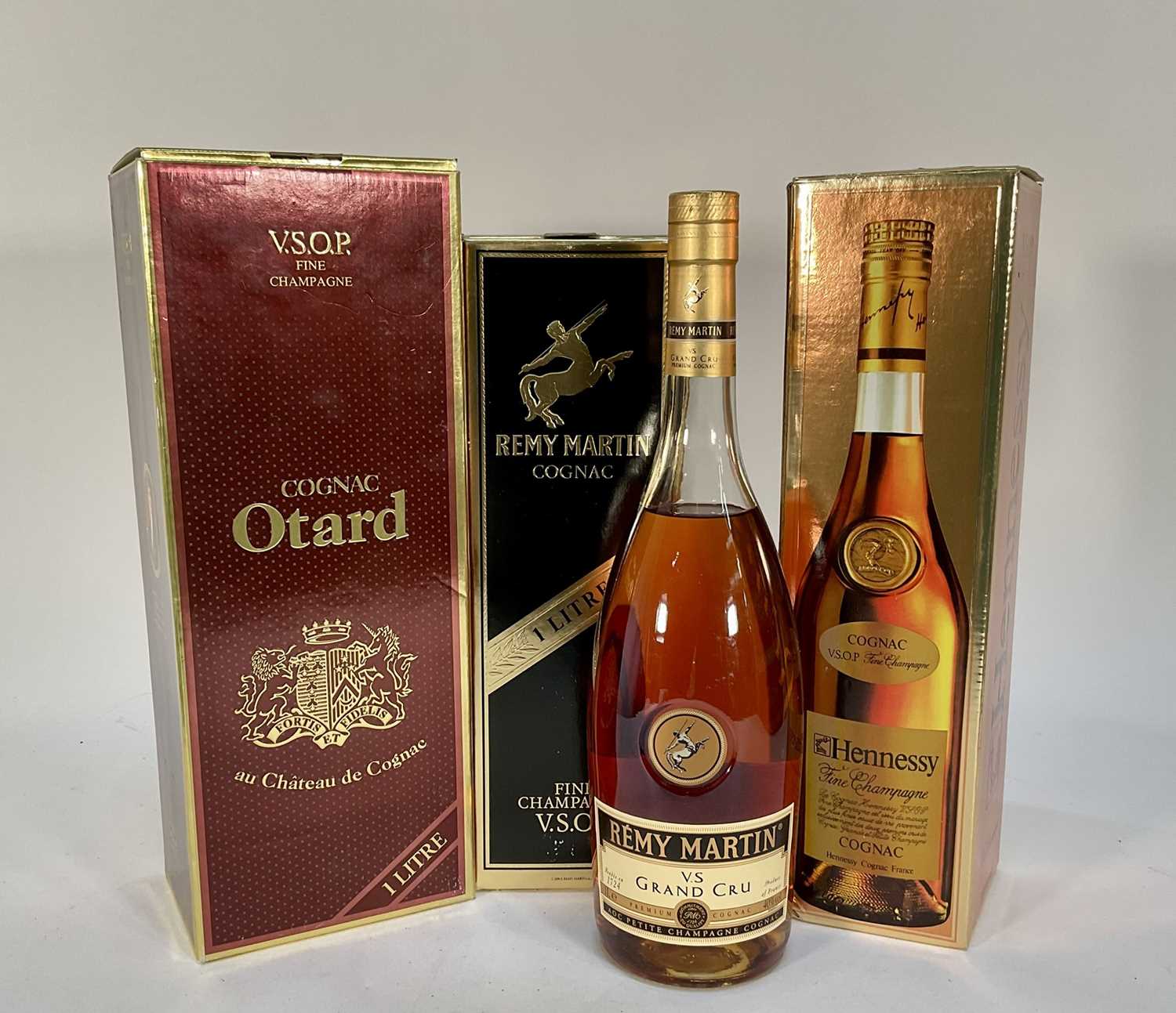 Lot 65 - Four bottles of Cognac, Remy Martin V.S.O.P, Remy Martin V.S Grand Cru, Hennessy V.S.O.P and Otard V.S.O.P, three boxed