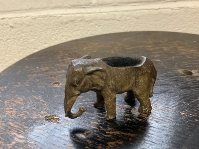Lot 221 - Early 20th century cold painted elephant pin cushion, 5.5cm long
