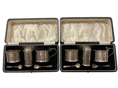Lot 962 - Two sets of 1930s silver condiments in fitted cases, retailed by Harrods, London