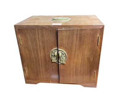 Lot 1447 - Chinese hardwood cabinet with four drawers, together with a small table (2)