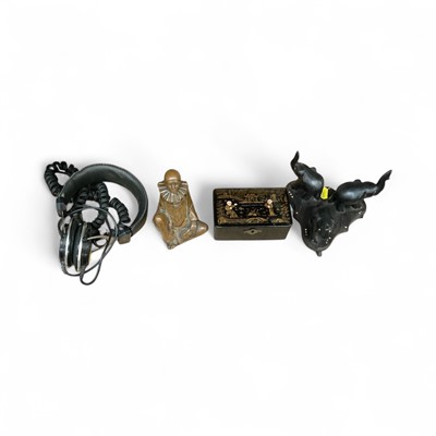 Lot 54 - Victorian chinoiserie money box, a bronzed figure of a clown, carved ebony elephants with bone inlay, and a pair of vintage headphones