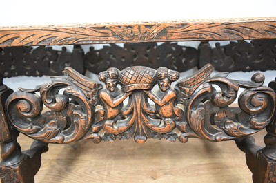Lot 1229 - 1920s Jacobean revival oak framed stool with canework top