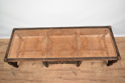 Lot 1229 - 1920s Jacobean revival oak framed stool with canework top